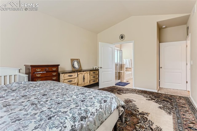 carpeted bedroom featuring lofted ceiling and baseboards