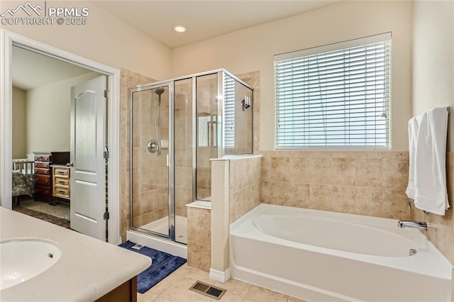 full bath featuring a garden tub, visible vents, a stall shower, vanity, and tile patterned floors