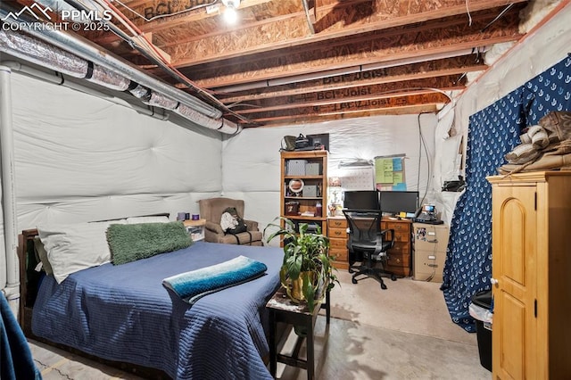 bedroom featuring concrete floors