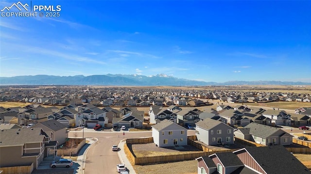 bird's eye view featuring a residential view and a mountain view