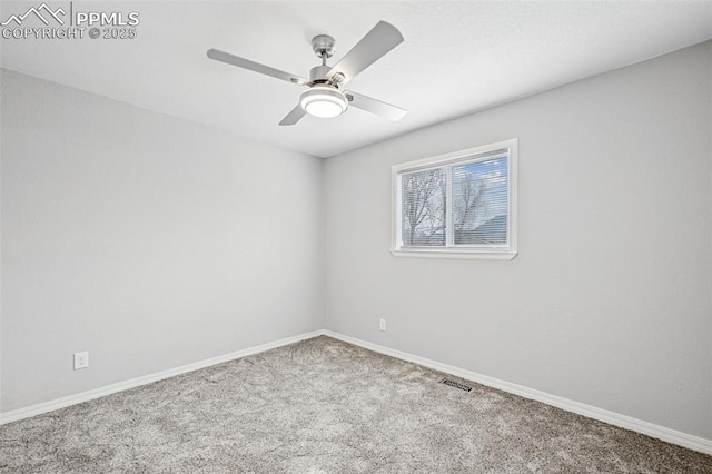 unfurnished room featuring carpet, visible vents, ceiling fan, and baseboards