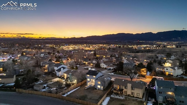 aerial view featuring a residential view and a mountain view