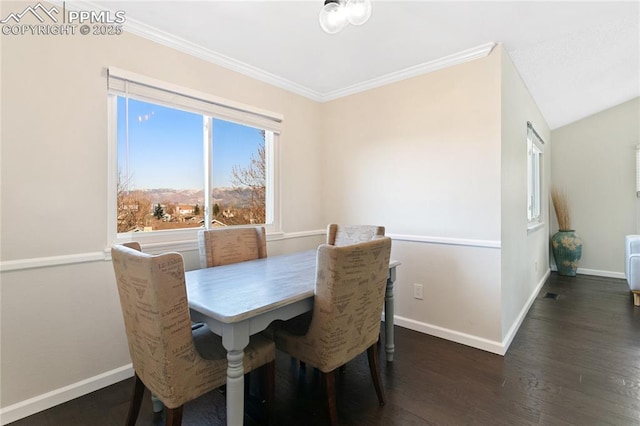 dining space with lofted ceiling, visible vents, ornamental molding, wood finished floors, and baseboards