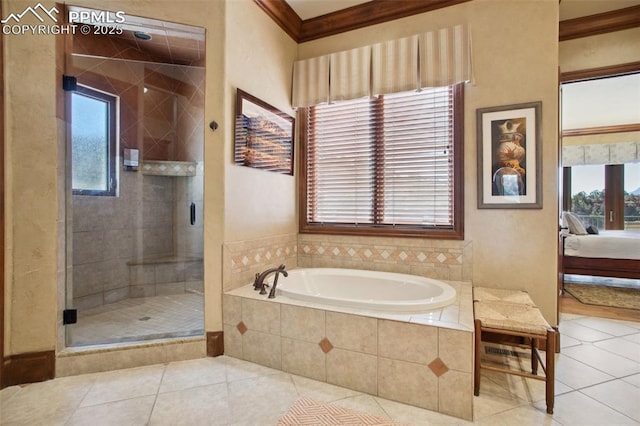 full bath featuring ensuite bathroom, a stall shower, a bath, and tile patterned floors