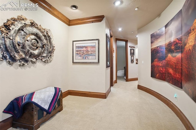 corridor featuring carpet floors, baseboards, and recessed lighting