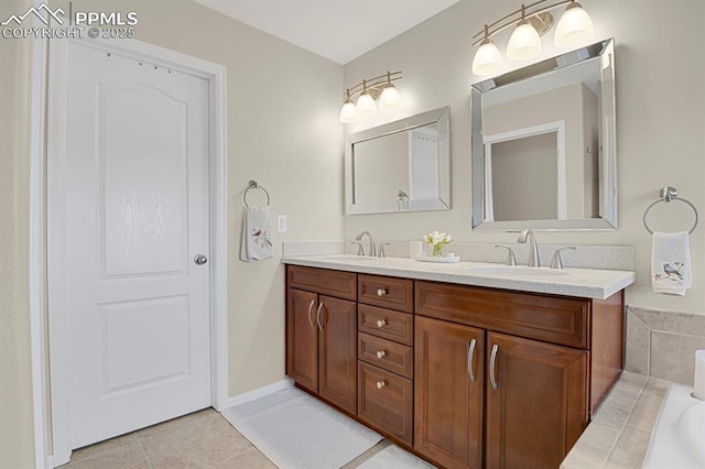 full bath featuring a sink, a washtub, double vanity, and tile patterned floors