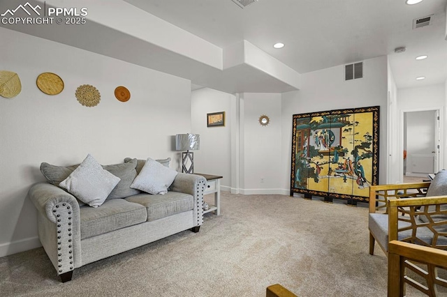 carpeted living room featuring recessed lighting, visible vents, and baseboards