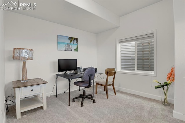 carpeted office with baseboards