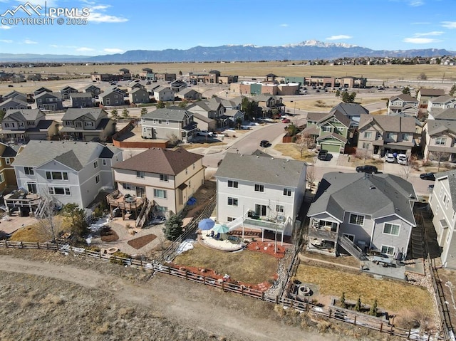 bird's eye view with a mountain view and a residential view