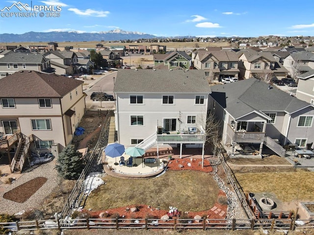 bird's eye view featuring a mountain view and a residential view