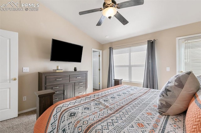 bedroom featuring a ceiling fan, lofted ceiling, carpet flooring, and baseboards