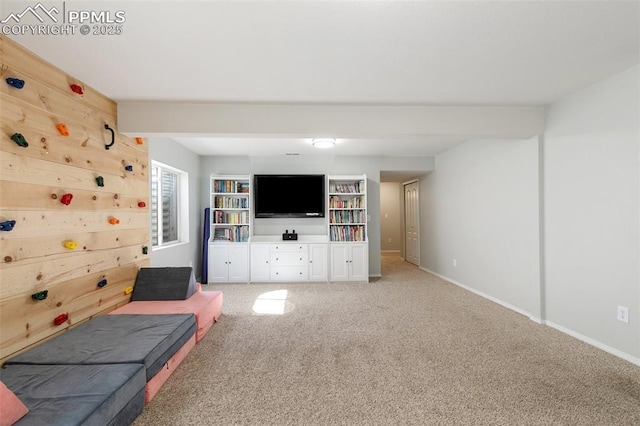 unfurnished living room featuring light carpet and baseboards