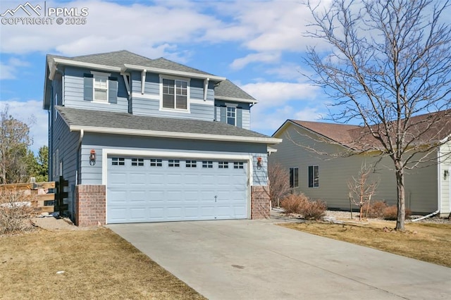 traditional home featuring a shingled roof, concrete driveway, brick siding, and an attached garage