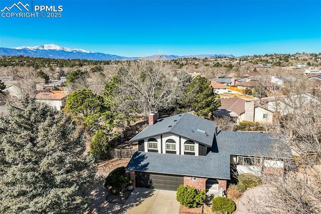 bird's eye view with a mountain view