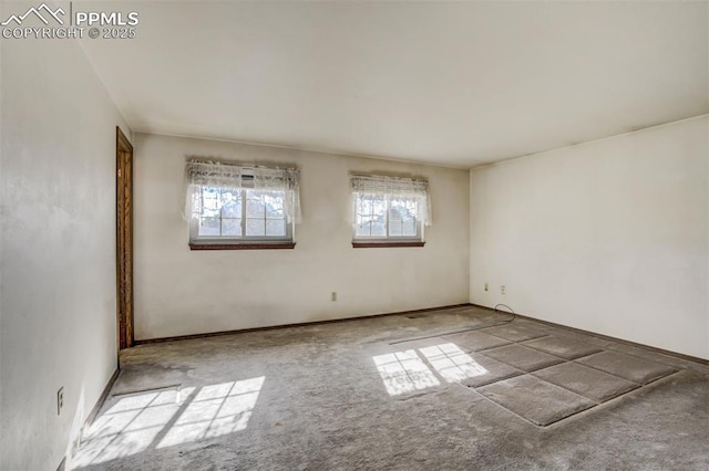 view of carpeted spare room