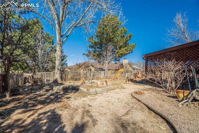 view of yard with fence