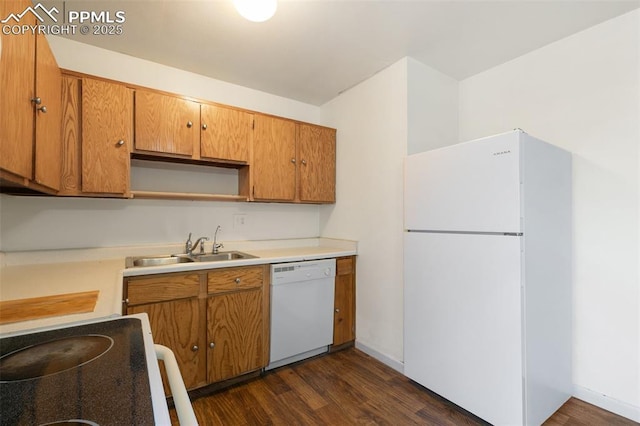 kitchen featuring brown cabinets, open shelves, dark wood-type flooring, a sink, and white appliances