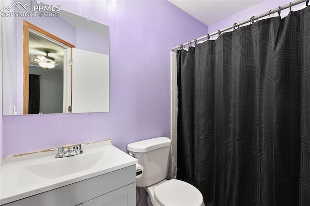 4054 Charleston Dr, Colorado Springs, CO 80916 - full bathroom with a shower with shower curtain, vanity, and toilet
