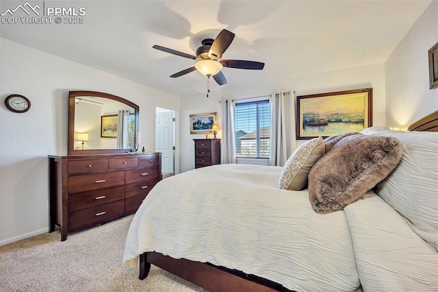 bedroom with baseboards, light colored carpet, and ceiling fan