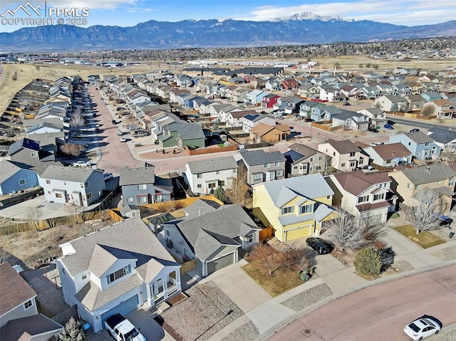 bird's eye view featuring a residential view and a mountain view