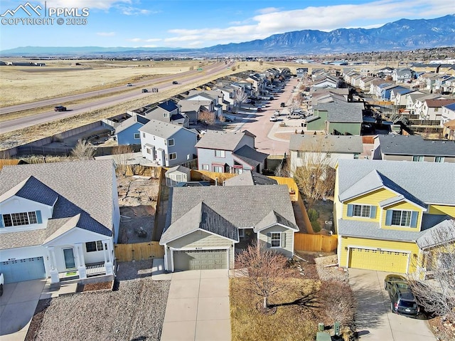 bird's eye view with a mountain view and a residential view