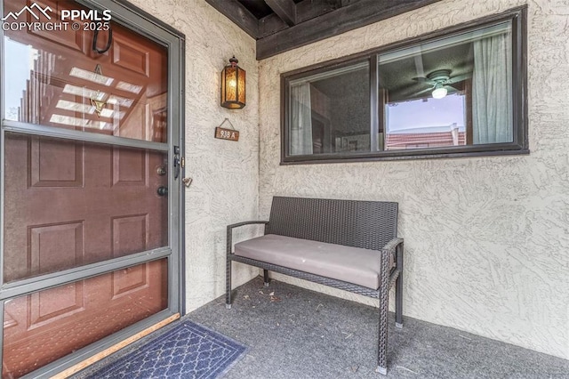 property entrance featuring stucco siding