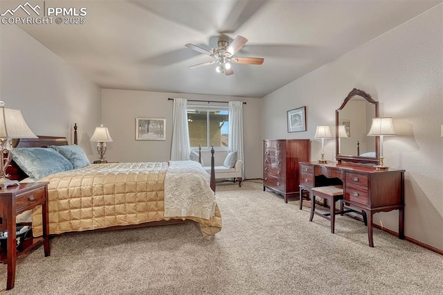 carpeted bedroom featuring a ceiling fan and baseboards