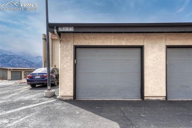 garage featuring a mountain view