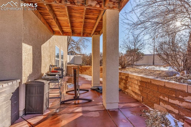 view of patio / terrace with fence