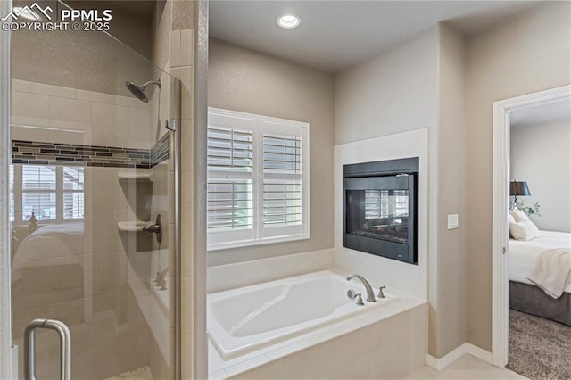 full bathroom featuring a stall shower, connected bathroom, recessed lighting, and a bath