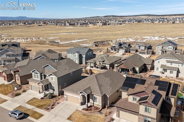 drone / aerial view with a residential view