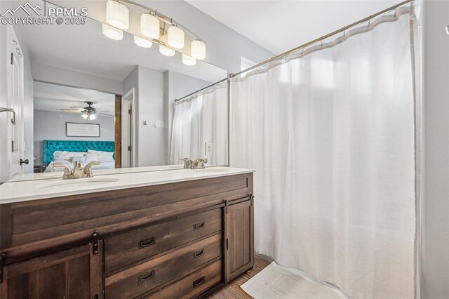 4925 Hawk Meadow Dr, Colorado Springs, CO 80916 - full bath featuring ceiling fan, a sink, ensuite bath, and double vanity