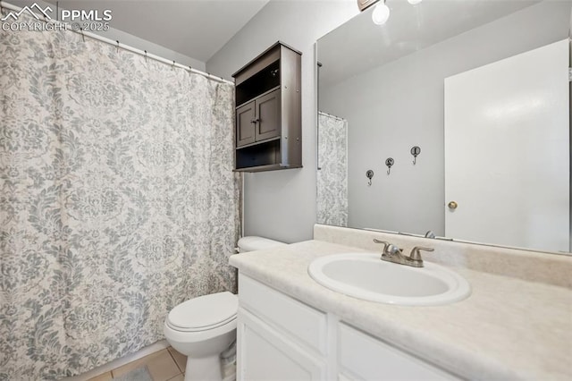 4925 Hawk Meadow Dr, Colorado Springs, CO 80916 - bathroom featuring toilet, vanity, and tile patterned floors