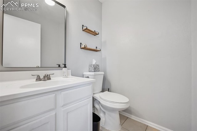 4925 Hawk Meadow Dr, Colorado Springs, CO 80916 - bathroom with vanity, tile patterned flooring, toilet, and baseboards
