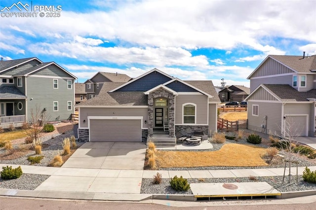 craftsman inspired home with a residential view, stone siding, and driveway