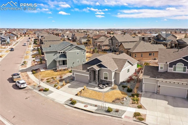 drone / aerial view with a residential view