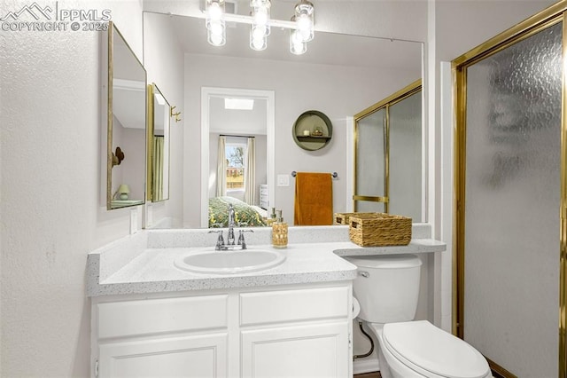 1908 Giltshire Dr, Colorado Springs, CO 80905 - bathroom with toilet, a stall shower, and vanity