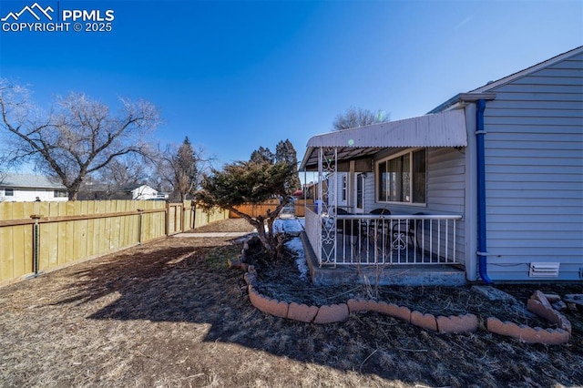 view of yard featuring a fenced backyard