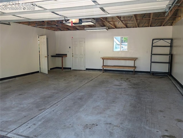 garage with baseboards