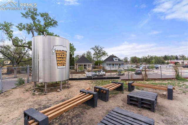 view of property's community with fence