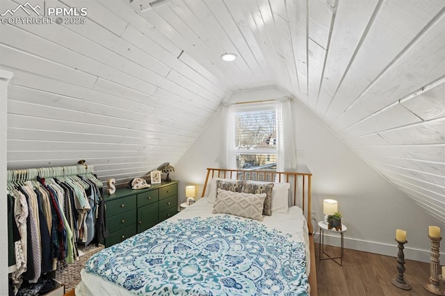 bedroom featuring wood ceiling, vaulted ceiling, baseboards, and wood finished floors