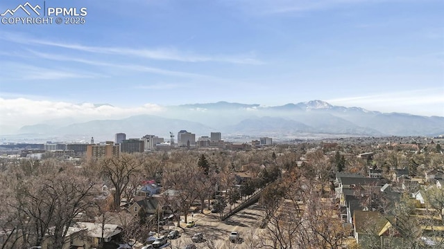 view of mountain feature with a view of city