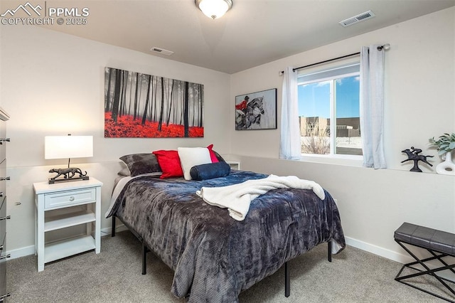 bedroom with carpet, visible vents, and baseboards