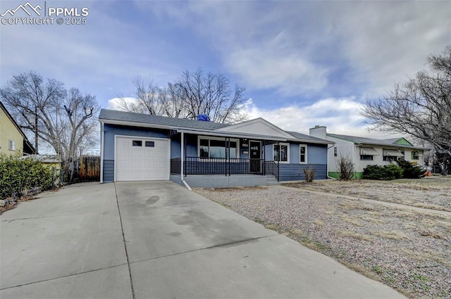 single story home with driveway, a chimney, an attached garage, fence, and a porch