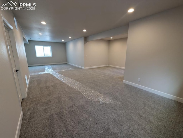 unfurnished room featuring recessed lighting, carpet flooring, and baseboards