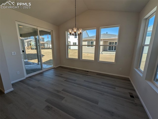 unfurnished dining area with a wealth of natural light, lofted ceiling, and visible vents