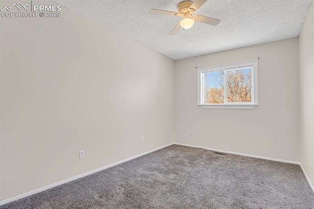 unfurnished room featuring carpet floors, a textured ceiling, baseboards, and a ceiling fan