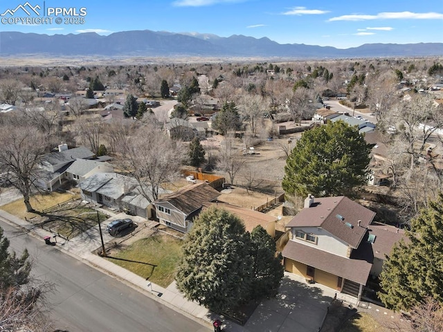 aerial view with a mountain view and a residential view