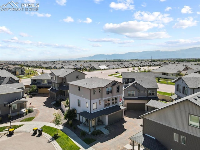 birds eye view of property featuring a residential view and a mountain view