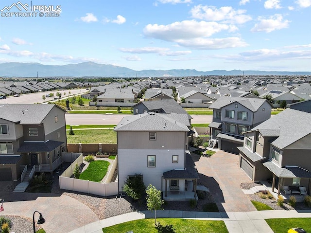 aerial view with a residential view and a mountain view